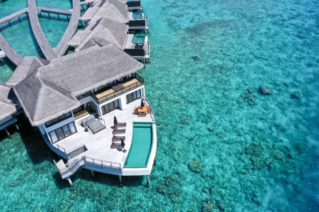 overwater bungalows worth it with a luxury villa, private pool, and clear turquoise lagoon